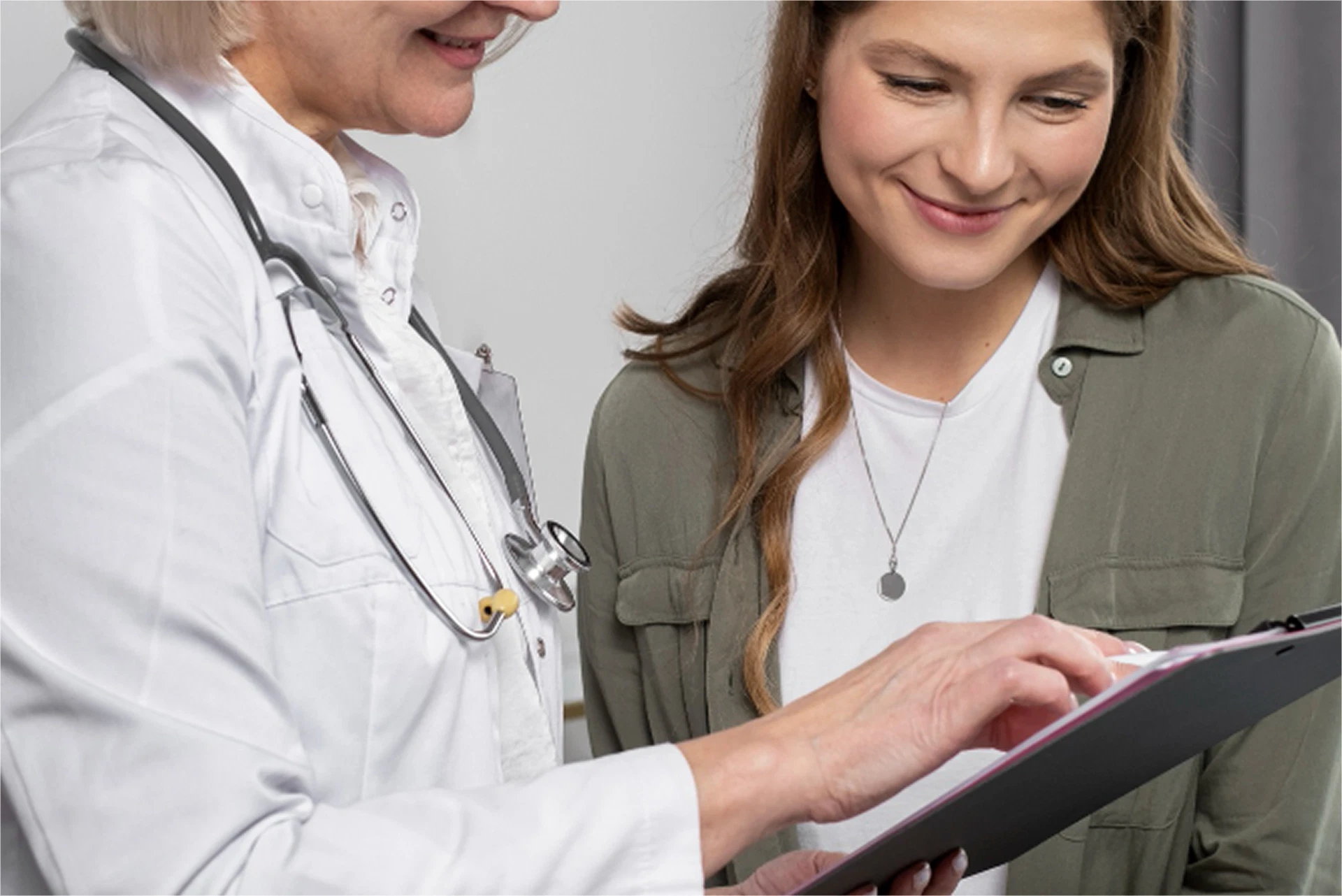 Clinician consulting with a patient